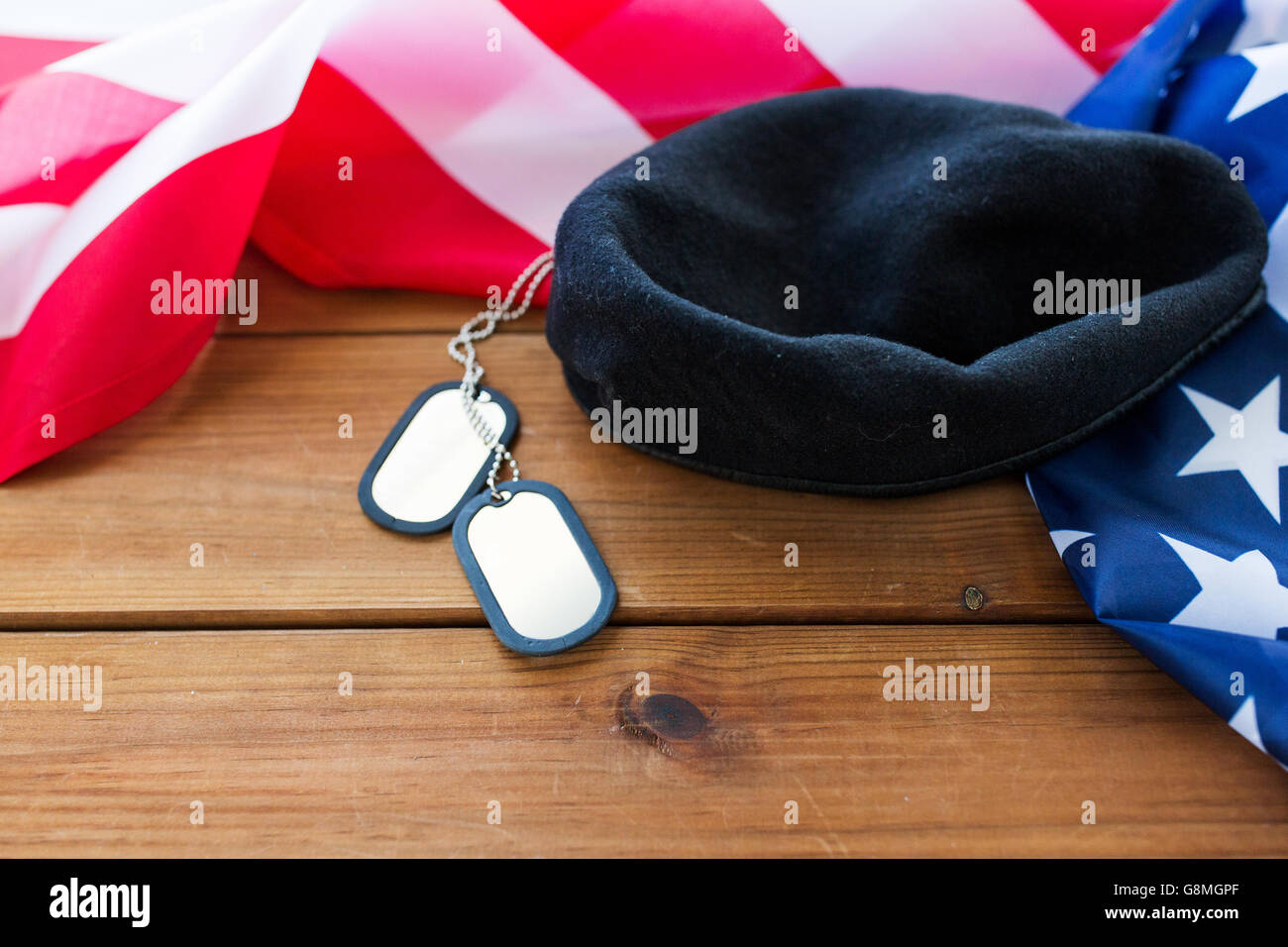 close up of american flag, hat and military badge Stock Photo