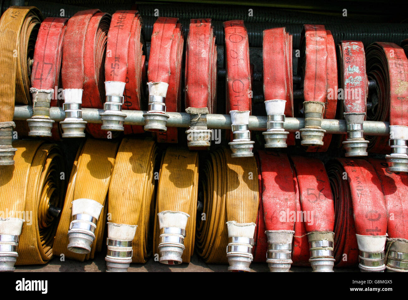 Fire hoses Stock Photo - Alamy