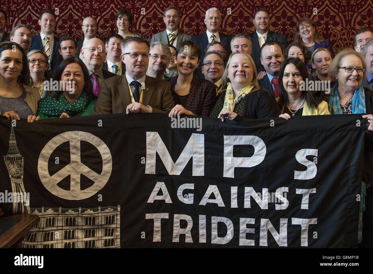 MPs from various parties hold a banner following a CND press conference to announce a Stop Trident demonstration in London on Saturday 27 February. Stock Photo