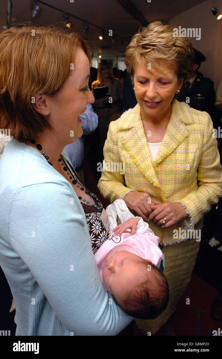President Mary McAleese meets an eight day old baby at the opening of a permanent new home for the Ombudsman for Children in Great Strand Street, Dublin, Saturday, September 3, 2005. n the 18 months since the Office opened in May 2004, demand for services has gone through the roof, with a staggering 75% increase in complaints since the beginning of the Summer. A total of 177 complaints were received in the first year of the Office. See PA story SOCIAL Ombudsman. PRESS ASSOCIATION Photo. Photo credit should read: Haydn West/PA Stock Photo