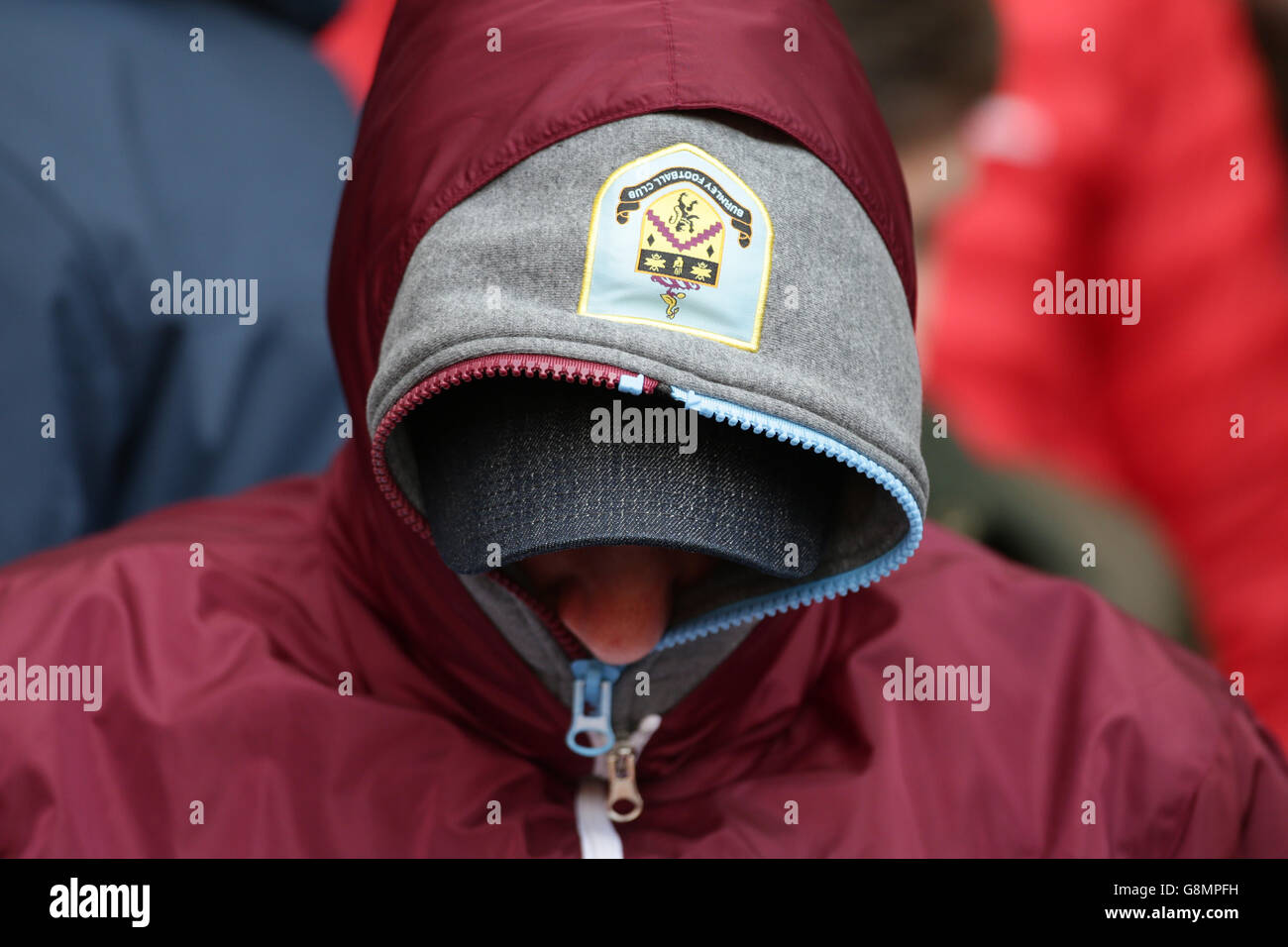 A Burnley fan in the crowd, before the Emirates FA Cup fourth round match against Arsenal at the Emirates Stadium, London. Stock Photo