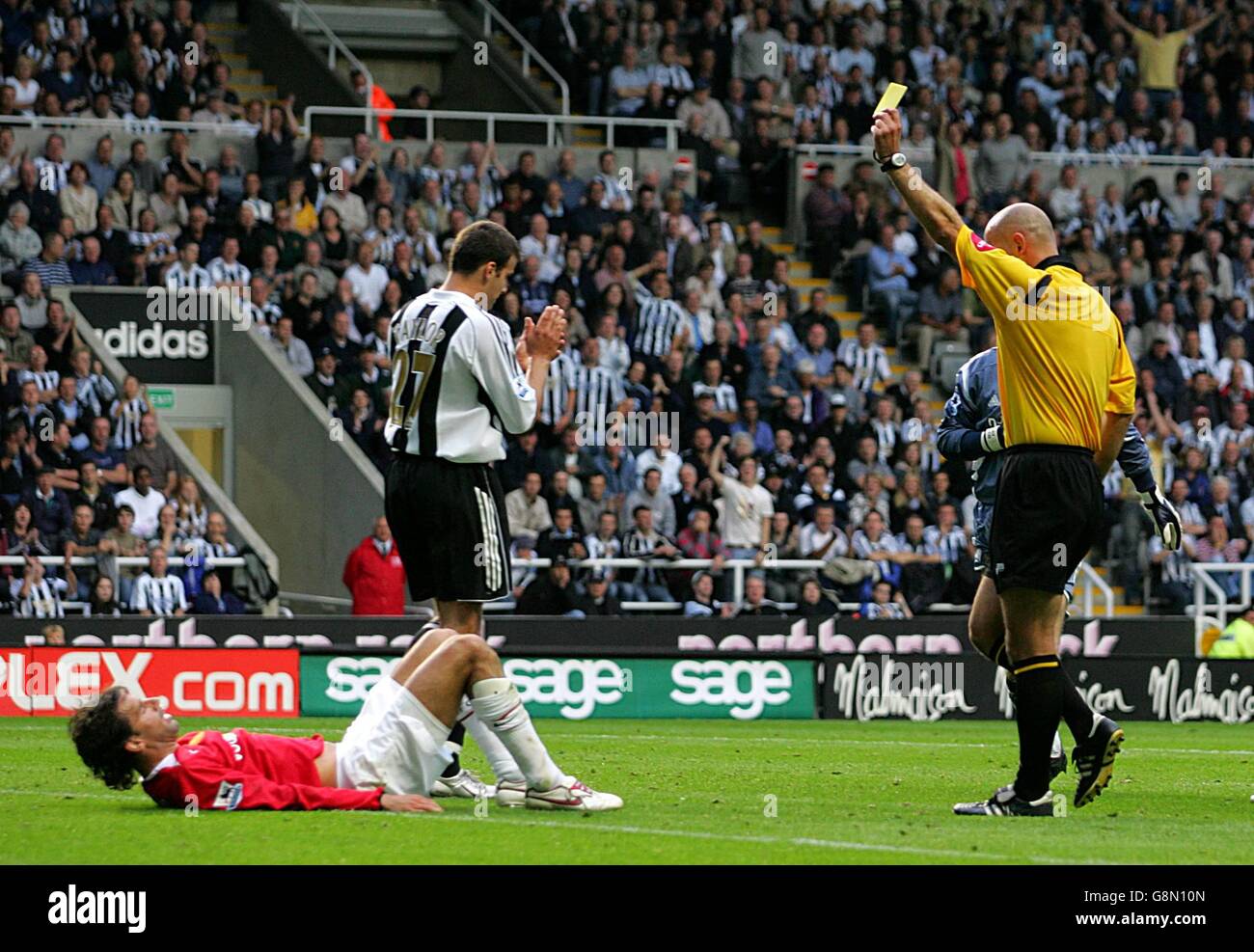 Soccer - FA Barclays Premiership - Newcastle United v Manchester United - St James' Park. Manchester United Ruud van Nistelrooy is booked for diving Stock Photo