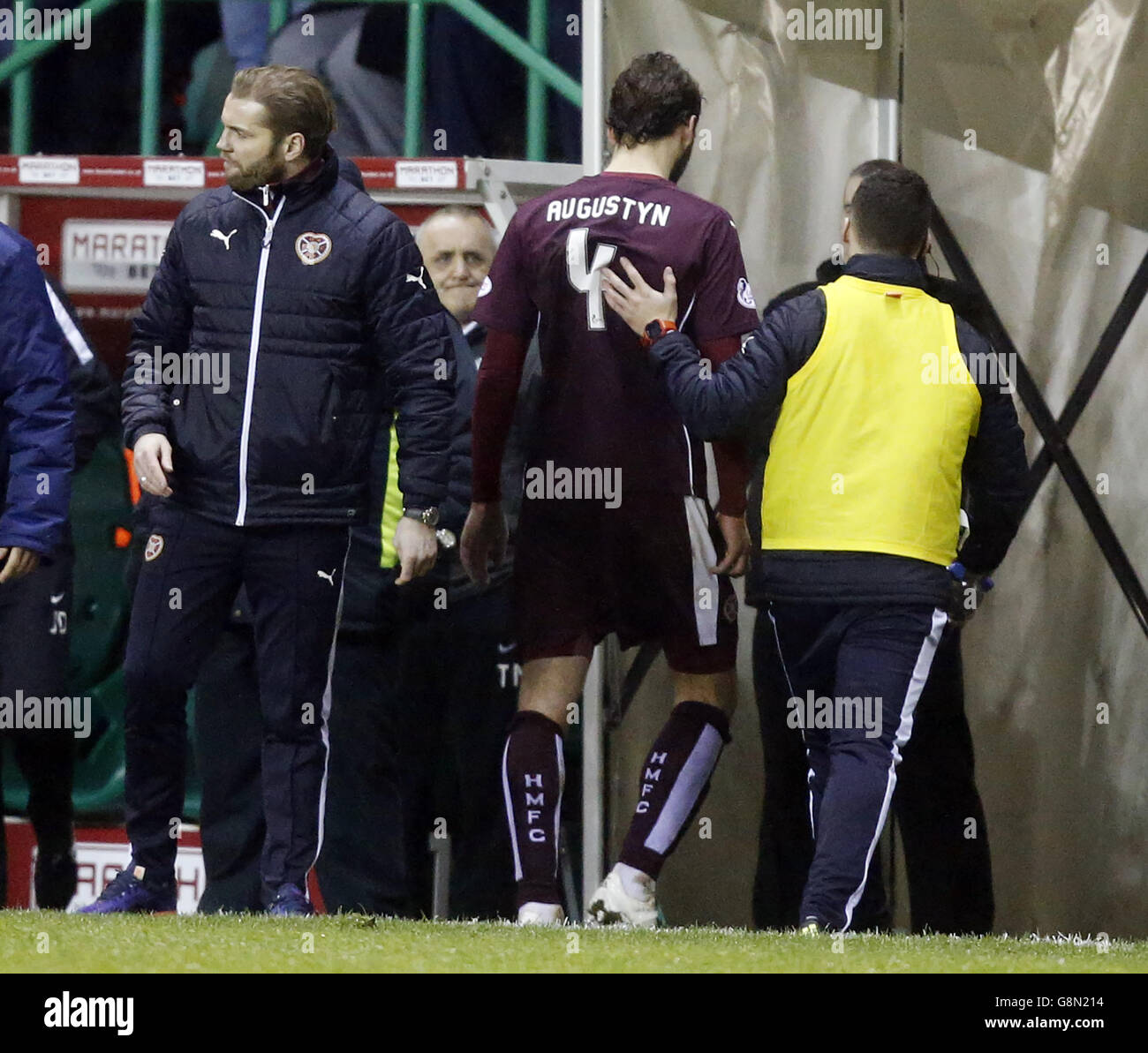 Heart of Midlothian manager Robbie Neilson (left) looks on as Blazej Augustyn walks off the pitch after receiving a red card during the William Hill Scottish Cup, Fifth Round Replay at Easter Road, Edinburgh. PRESS ASSOCIATION Photo. Picture date: Tuesday February 16, 2016. See PA story SOCCER Hibernian. Photo credit should read: Danny Lawson/PA Wire. Stock Photo