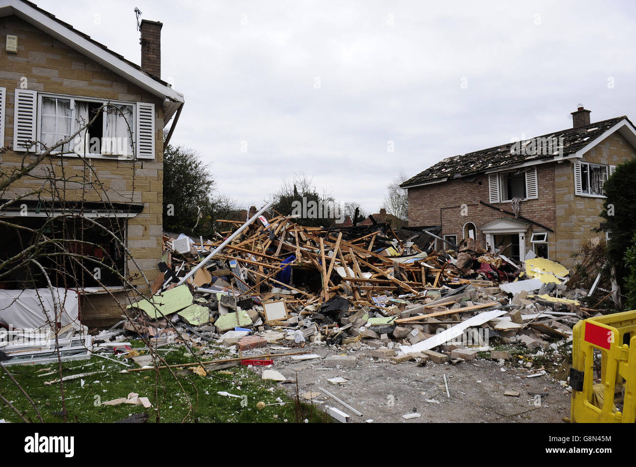 Explosion demolishes house Stock Photo - Alamy