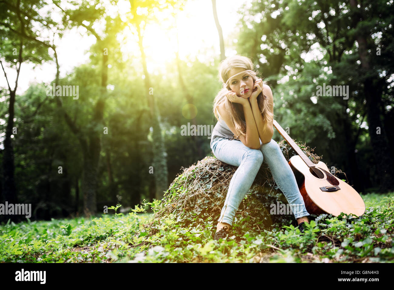 Depressed girl filling void after breakup in nature Stock Photo
