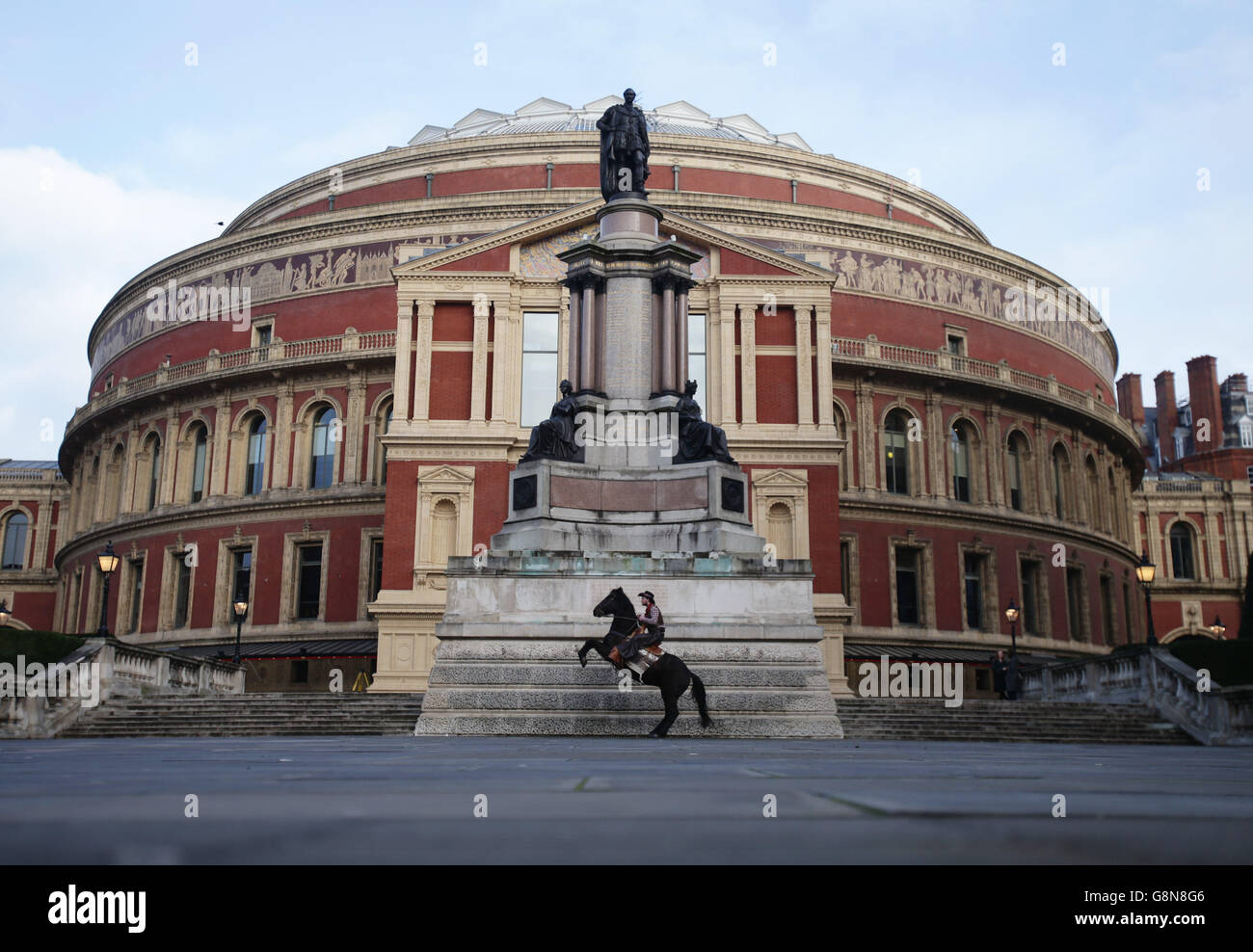 Stunt horse-riding cowboy Ollie Bass and his horse Rocky pose on the steps of the Royal Albert Hall, London, to promote a forthcoming Western Music in Concert show at the venue. Stock Photo