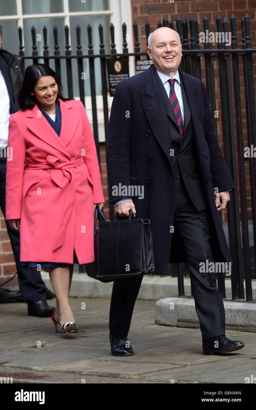 Minister of State for Employment Priti Patel and Work and Pensions Secretary Iain Duncan Smith arrive at 10 Downing Street in London ahead of a Cabinet meeting to discuss David Cameron's newly-secured EU reform deal. Stock Photo