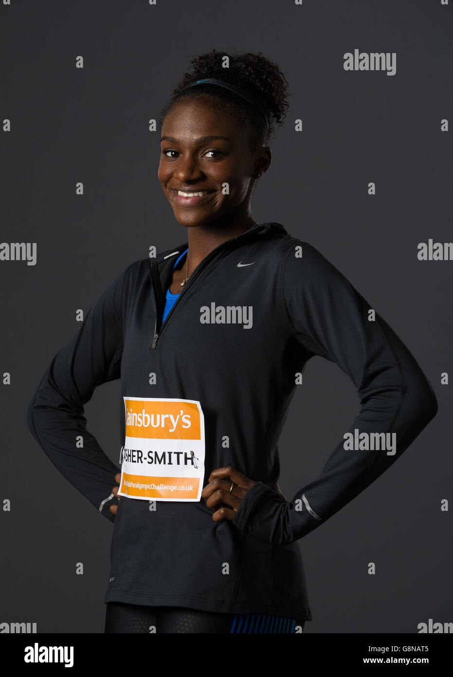 Dina Asher-Smith during a visually impaired sprint masterclass to promote the Sainsbury's Active Kids Paralympics Challenge at Lee Valley Athletics Centre, London. Stock Photo