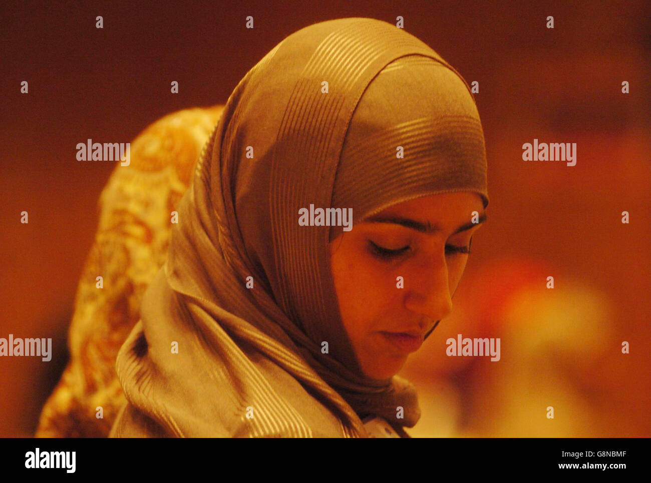 A muslim woman wears a hijab inside the Great Hall of Kensington Town