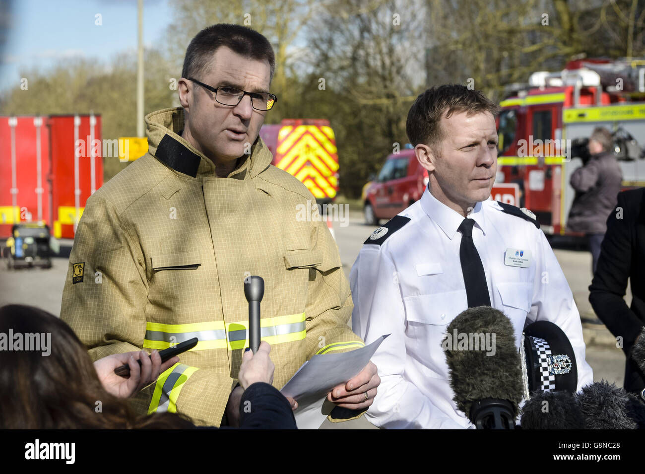 Chief Fire Officer Dave Etheridge from Oxfordshire Fire and Rescue Services and Assistant Chief Constable Scott Chilton for Operations from Thames Valley police, give a press conference at Didcot Power Station, Oxfordshire, as emergency crews said that it is 'highly unlikely' three people missing after part of a power station collapsed are alive. Stock Photo