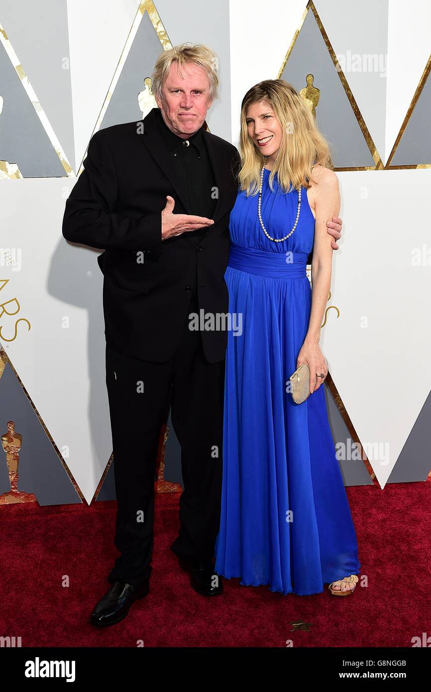 Gary Busey and Steffanie Sampson arriving at the 88th Academy Awards