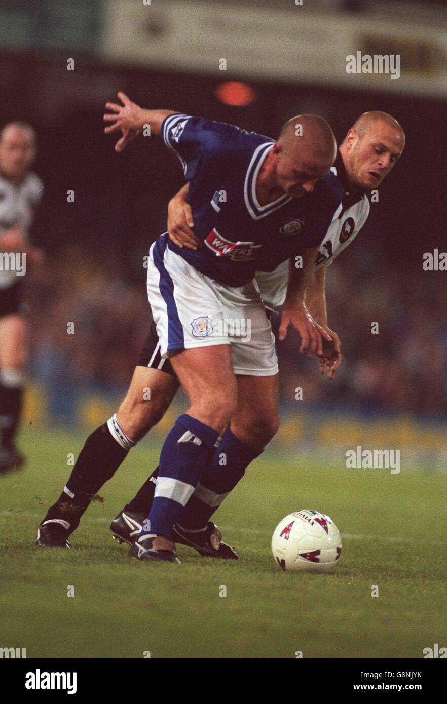 Spencer Prior of Leicester City (left) is held by Robin Van der Laan
