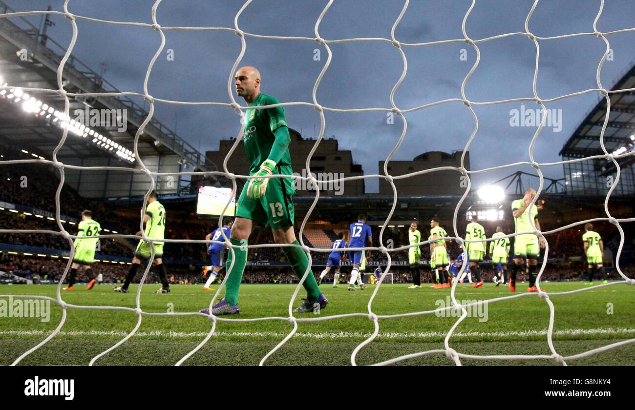 Manchester City goalkeeper Willy Caballero dejected after Chelsea's Oscar scores the third goal from a free kick during the Emirates FA Cup, fifth round match at Stamford Bridge, London. Stock Photo
