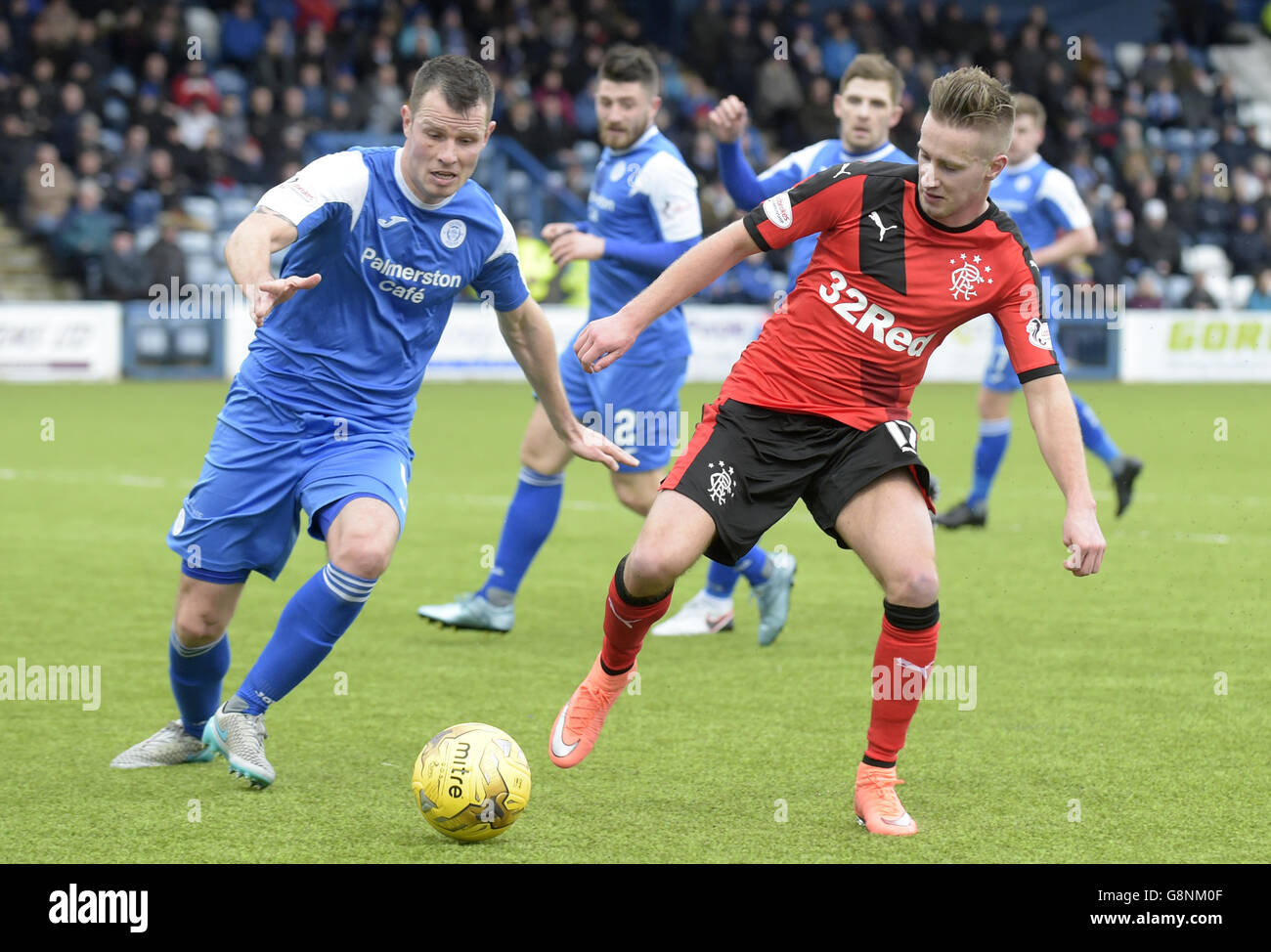 Queen of the South's Andrew Dowie and Rangers' Billy King battle for ...