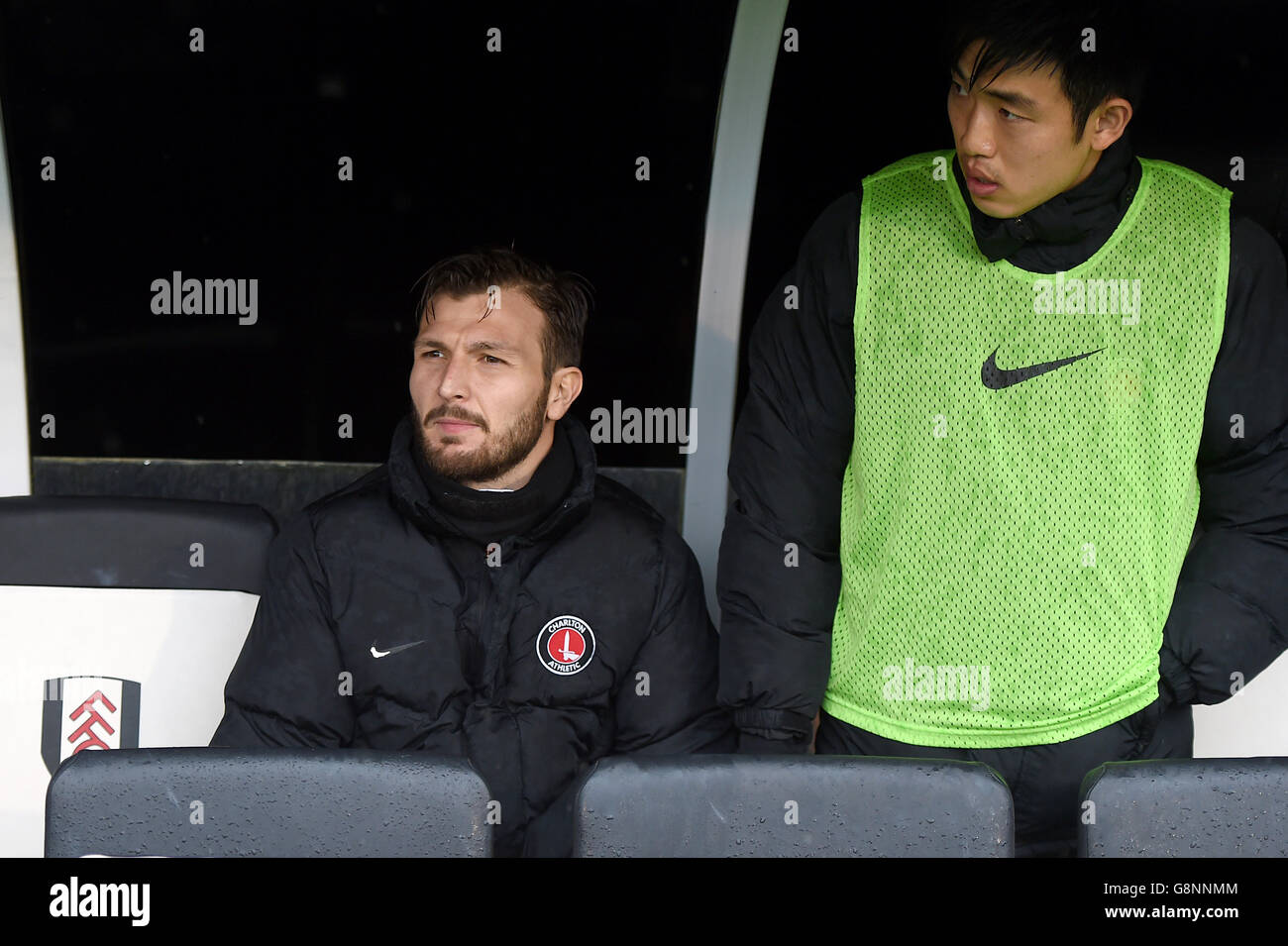 Charlton Athletic's Marco Motta and Yun Suk-Young (right) on the bench before the game Stock Photo