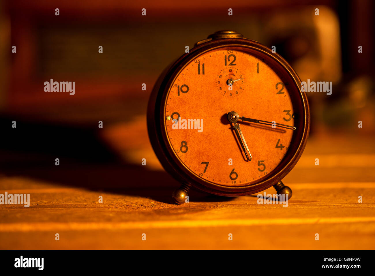old alarm clock on background Stock Photo - Alamy