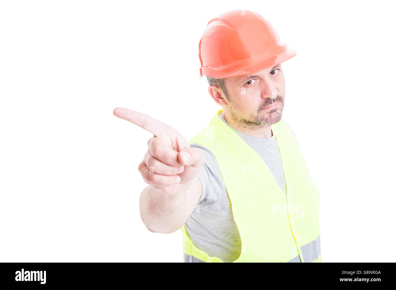 Portrait of serious constructor making refuse or no gesture with index finger isolated on white background Stock Photo