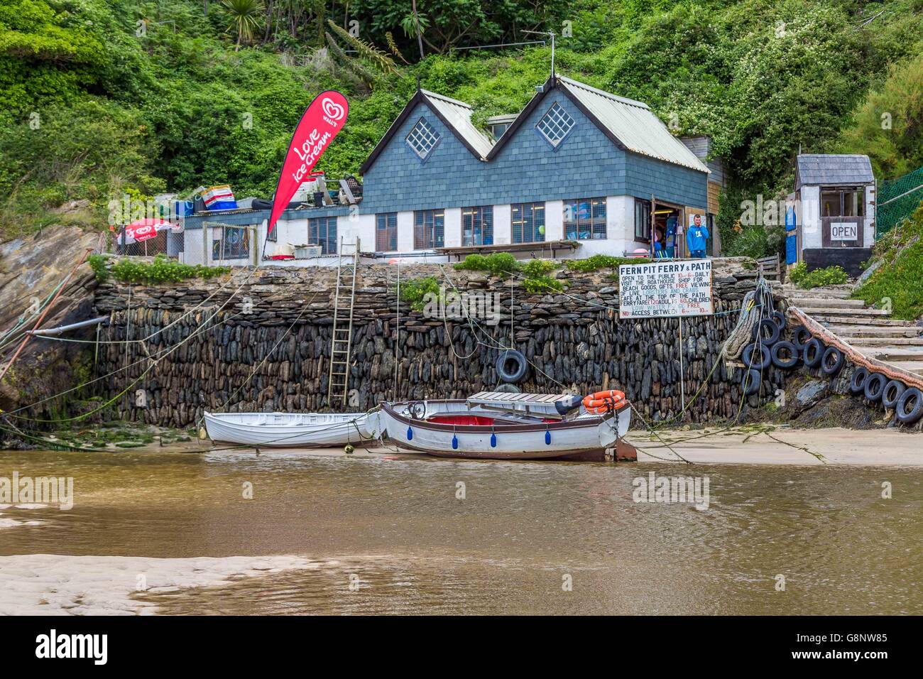 A boat house with boats on the river Gannel estuary, Crantock Beach, near Newquay in Cornwall, UK. Stock Photo