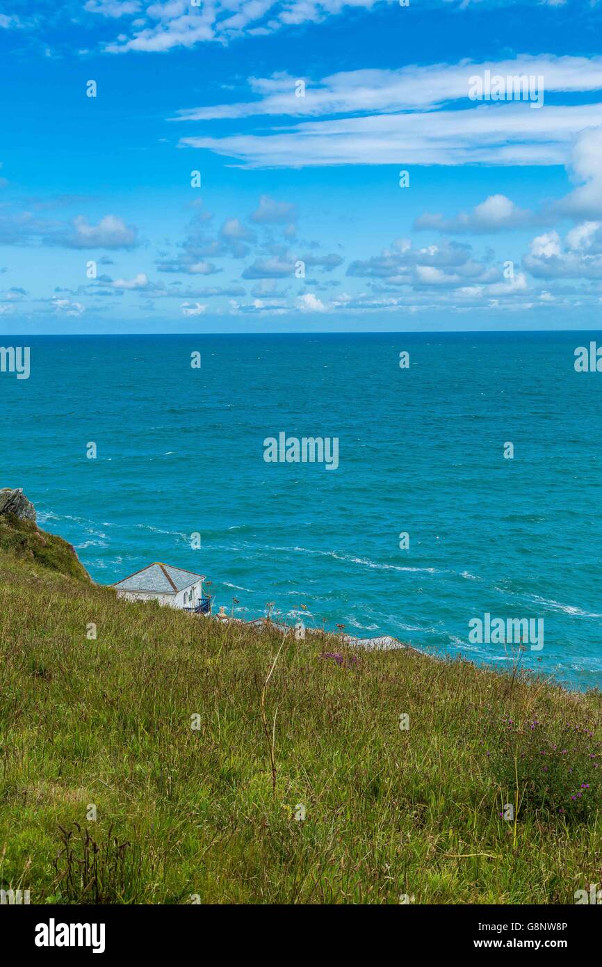 West Pentire waves and the blue sea ocean off the Cornish coast UK Stock Photo
