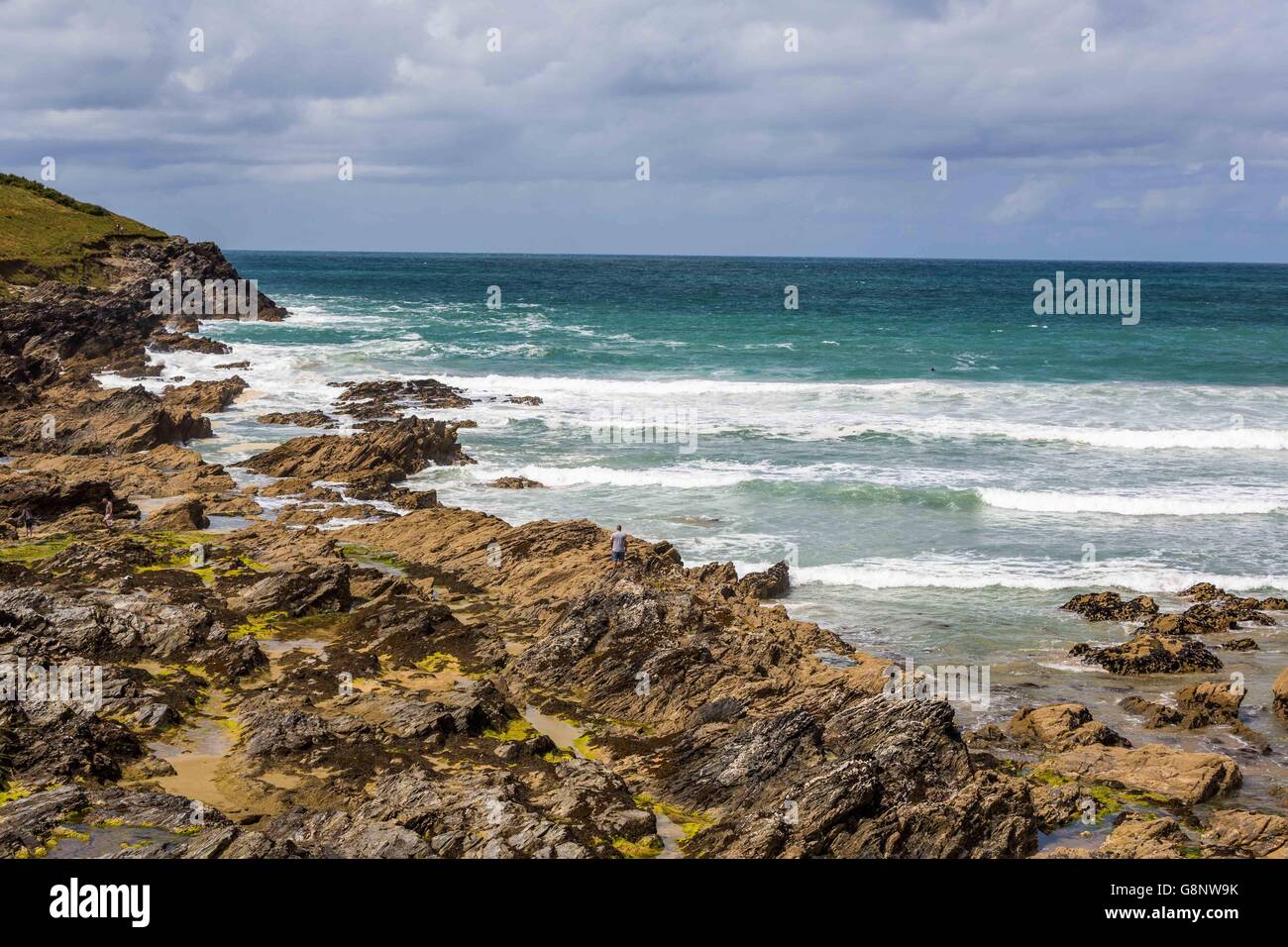 West Pentire waves and the blue sea ocean off the Cornish coast UK Stock Photo