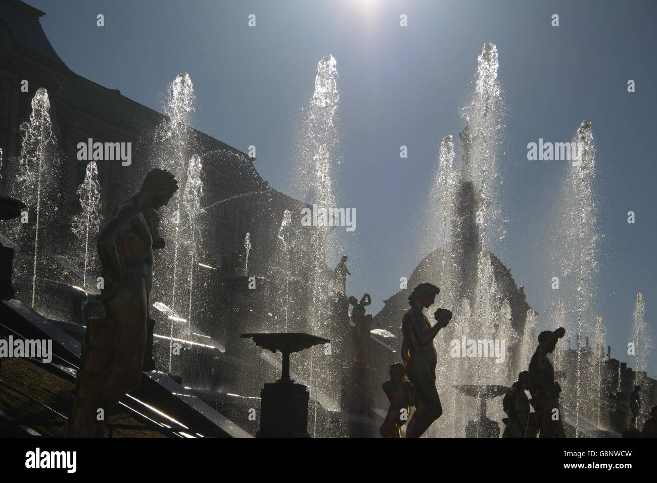 fountain jets against sky Stock Photo
