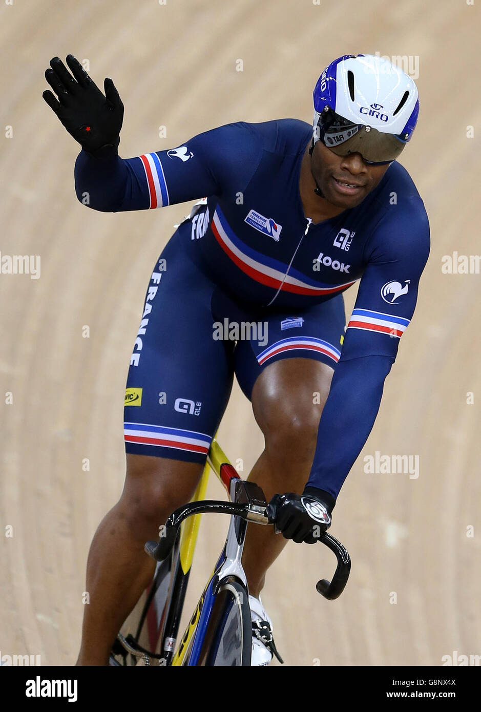 France's Gregory Bauge waves to the crowd after competing in the Men's Sprint during day three of the UCI Track Cycling World Championships at Lee Valley VeloPark, London. Stock Photo