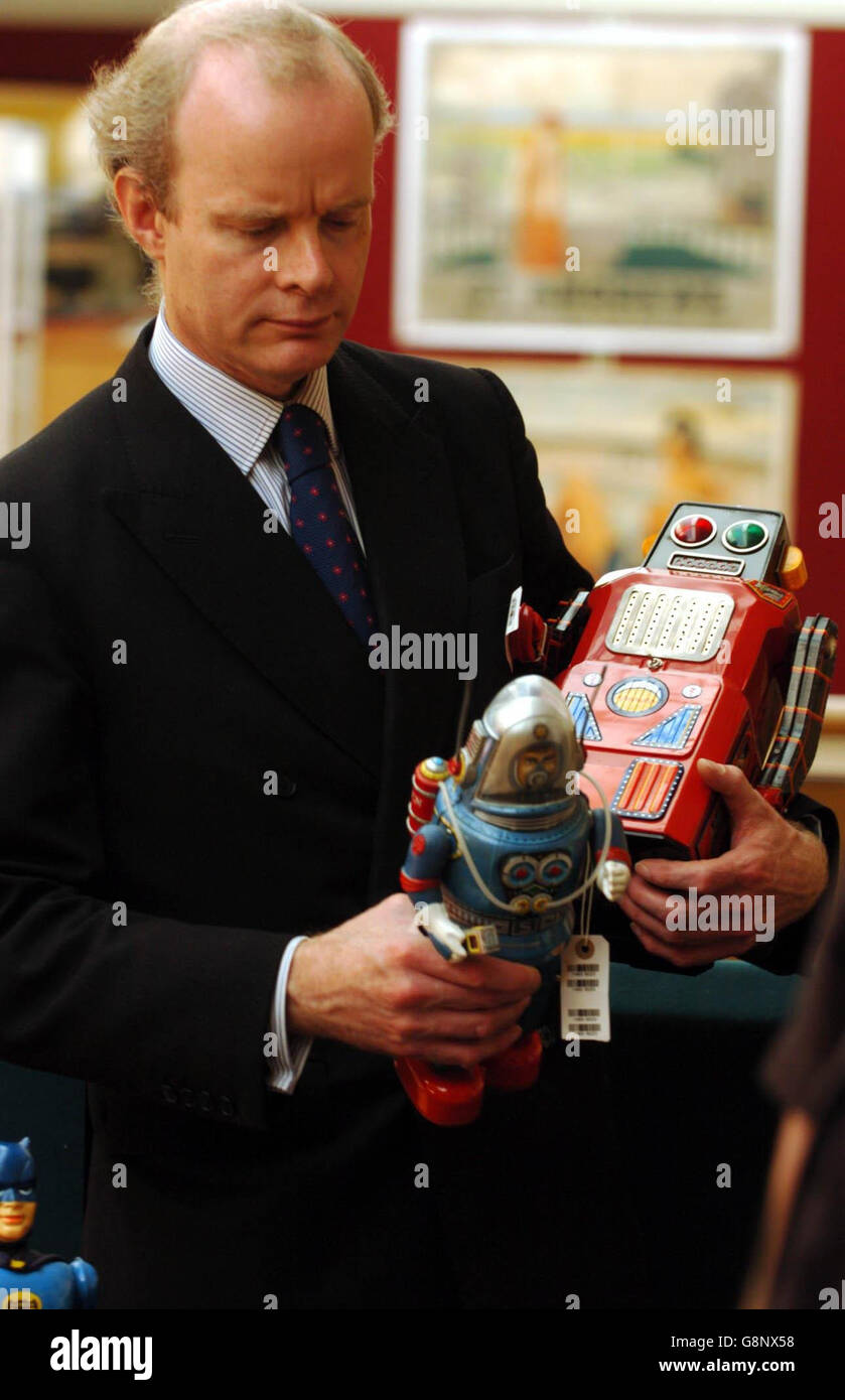 CHRISTIES TOY AUCTION. 200,000 for their owner Stock Photo Alamy