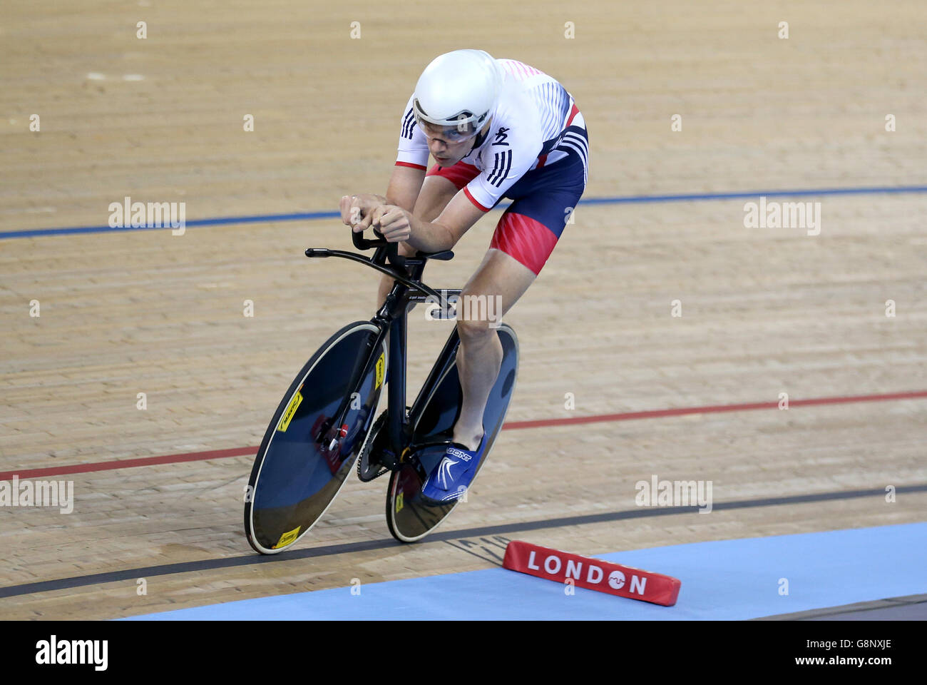 Great Britain's Andrew Tennant competes in the Men's Individual Pursuit during day three of the UCI Track Cycling World Championships at Lee Valley VeloPark, London. Stock Photo