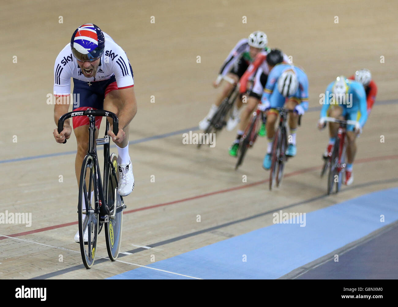 Great Britain's Jonathan Dibben crosses the line to win gold in the Men's Points Race during day three of the UCI Track Cycling World Championships at Lee Valley VeloPark, London. Stock Photo