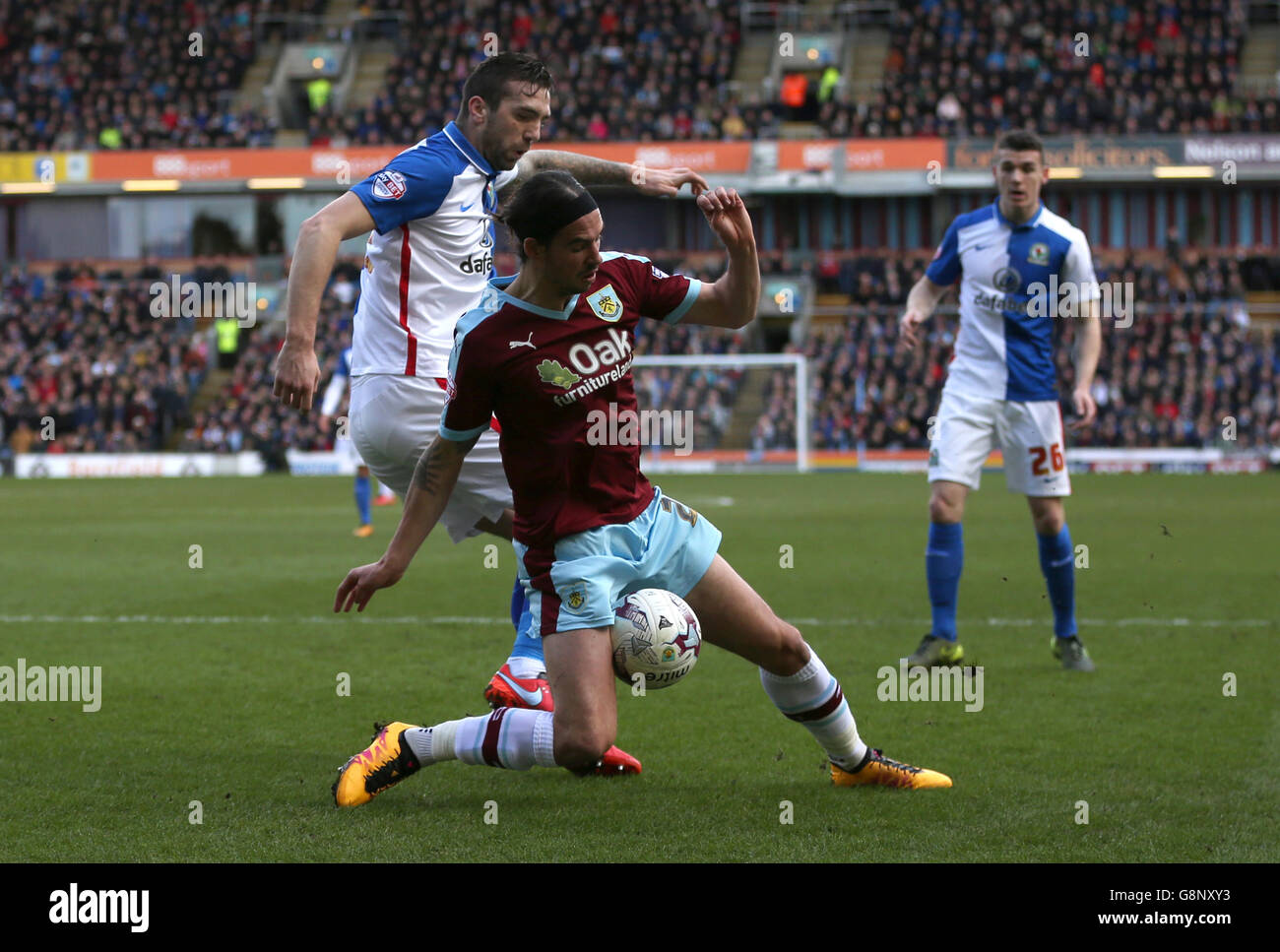 Blackburn Rovers' Shane Duffy (left) fouls Burnley's George Boyd to concede a penalty the Sky Bet Championship match at Turf Moor, Burnley. Stock Photo