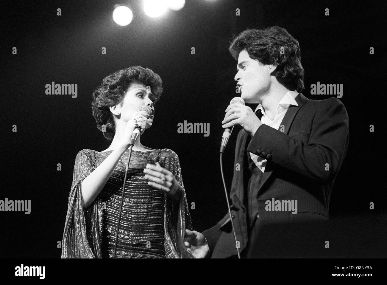 Donny Osmond, and his sister Marie sing in unison during the pop family group's concert at the Rainbow Theatre, Finsbury Park, London. Stock Photo