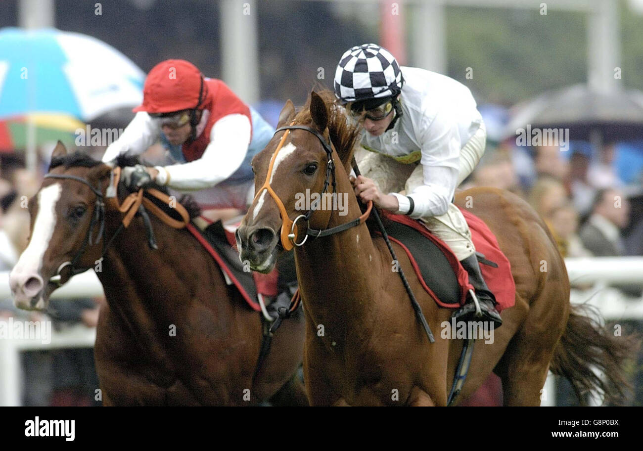 Godfrey Street ridden by Ryan Moore moves ahead to win the Poly Pipe Childers Stakes at Doncaster racecourse, Saturday September 10, 2005. PRESS ASSOCIATION Photo. Photo credit should read: PA. Stock Photo