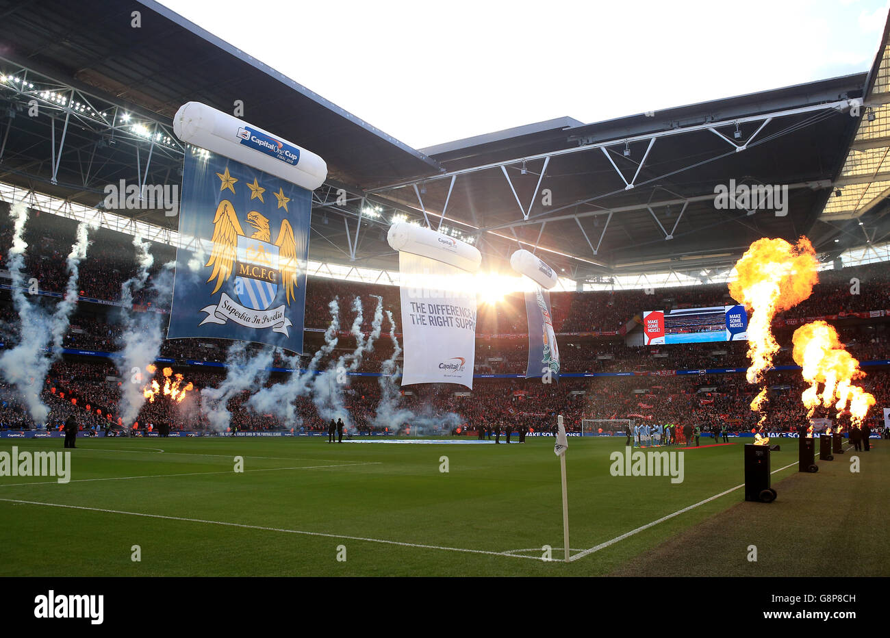 Liverpool v Manchester City - Capital One Cup - Final - Wembley Stadium. Pyrotechnics go off before kick off in the Capital One Cup final at Wembley Stadium, London. Stock Photo