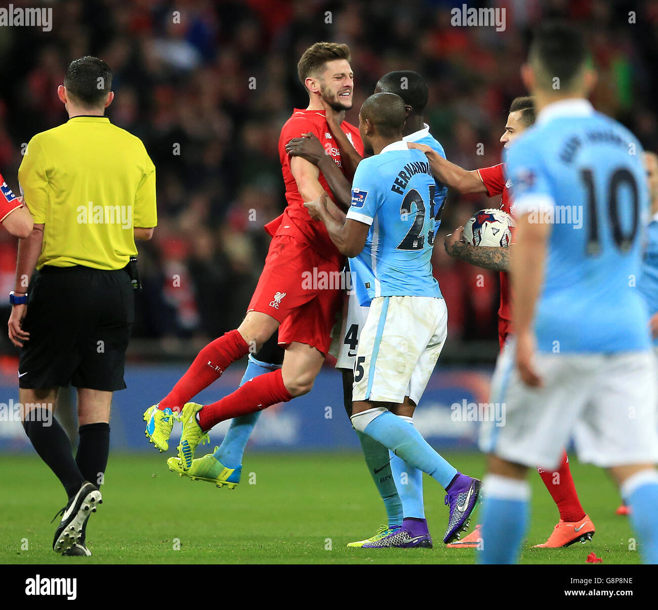 manchester-citys-yaya-toure-centre-right-and-liverpools-adam-lallana-G8P8NE.jpg