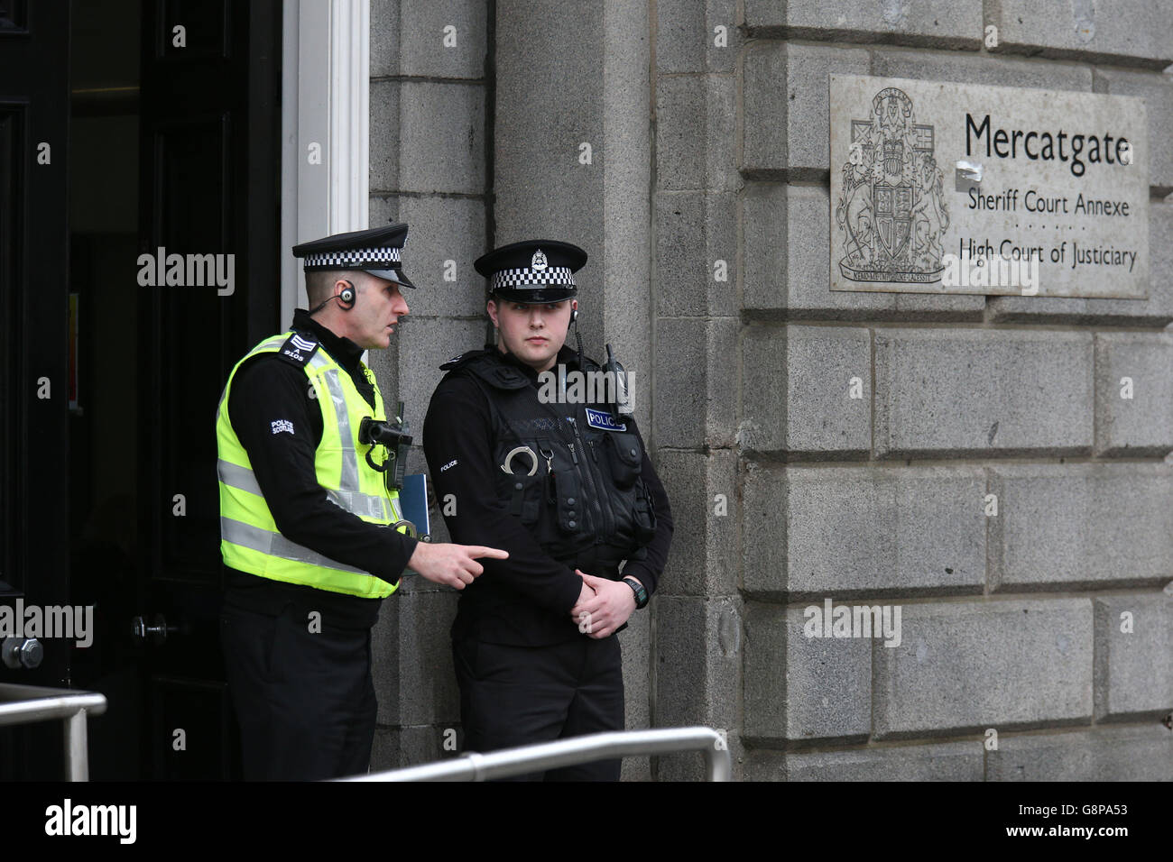 Police outside Aberdeen High Court, where a youth, who cannot be named