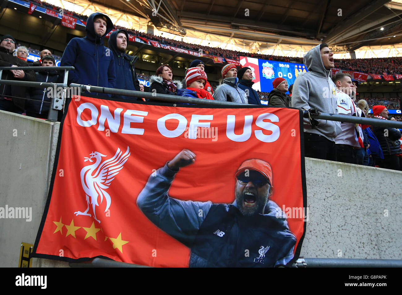 A general view of Liverpool fans in the crowd with a Liverpool manager  Jurgen Klopp banner Stock Photo - Alamy
