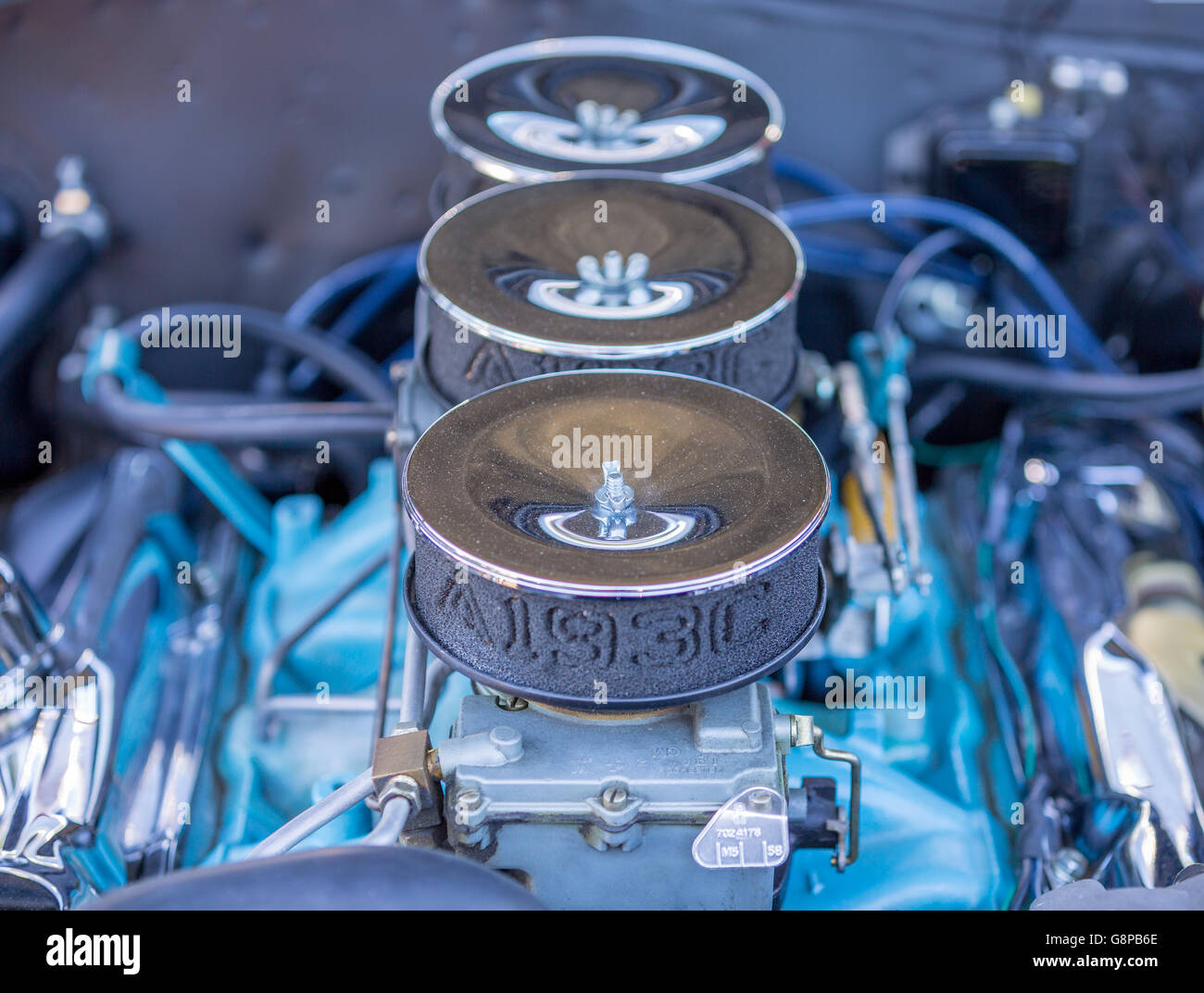 triple carbs on a muscle car Stock Photo