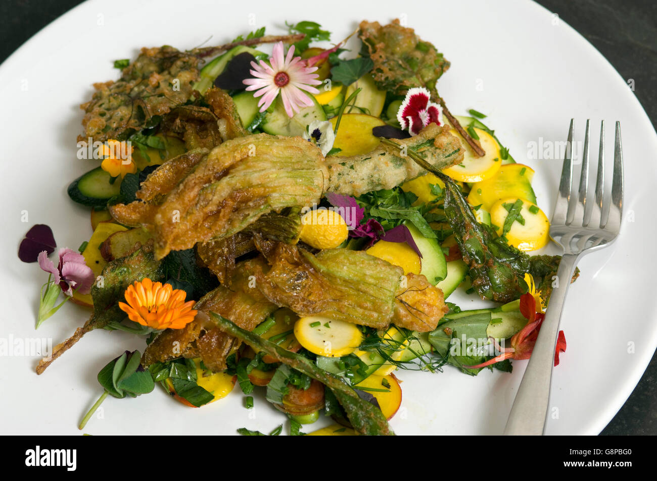 A courgette salad using edible flowers. a UK Stock Photo Alamy