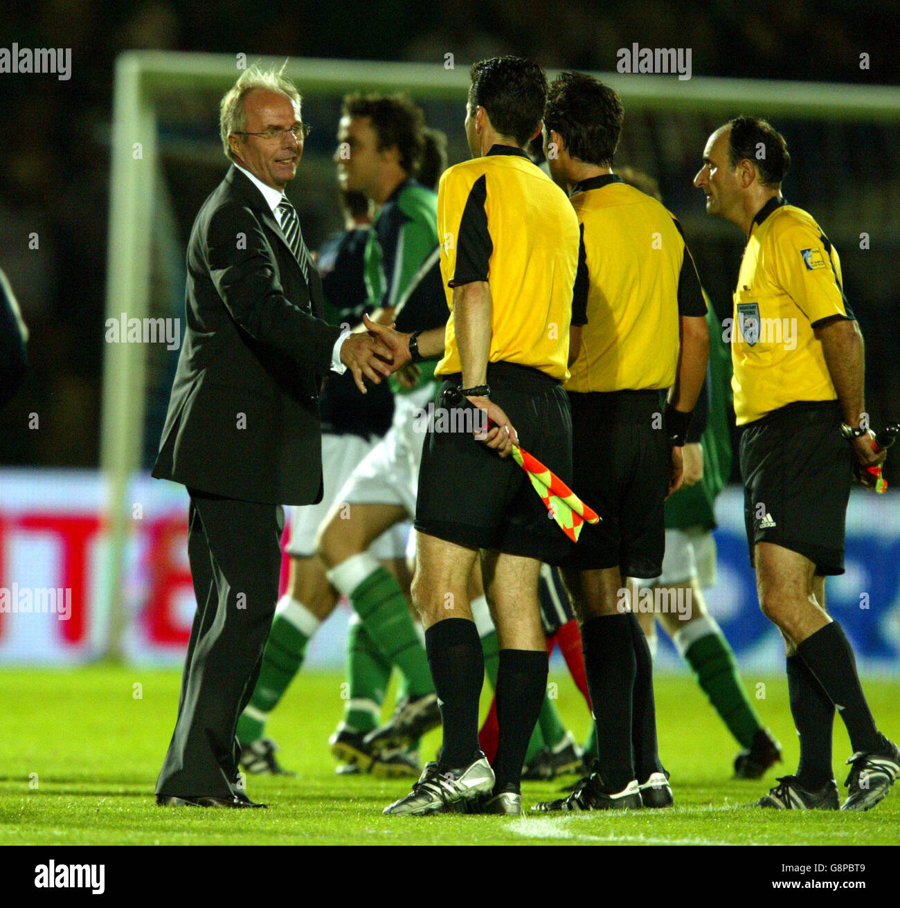 England's manager Sven Goran-Eriksson shakes hands with referee Massimo ...