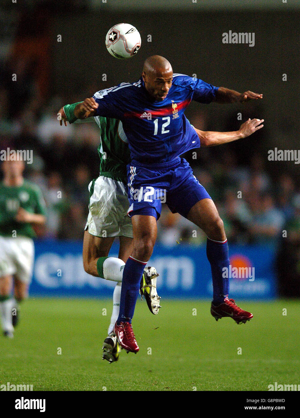 France's Thierry Henry clashes with Ireland's Roy Keane Stock Photo