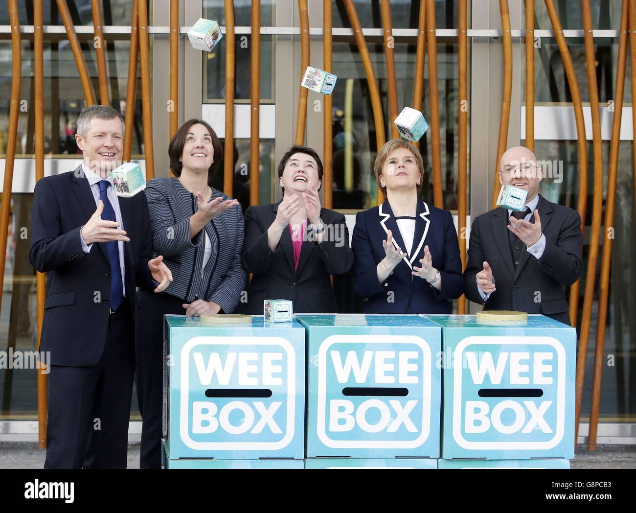 The leaders of all five main political parties in Scotland (left to right) Willie Rennie, Kezia Dugdale, Ruth Davidson, Nicola Sturgeon and Patrick Harvie, launch the annual Sciaf appeal outside the Scottish Parliament in Edinburgh. Stock Photo
