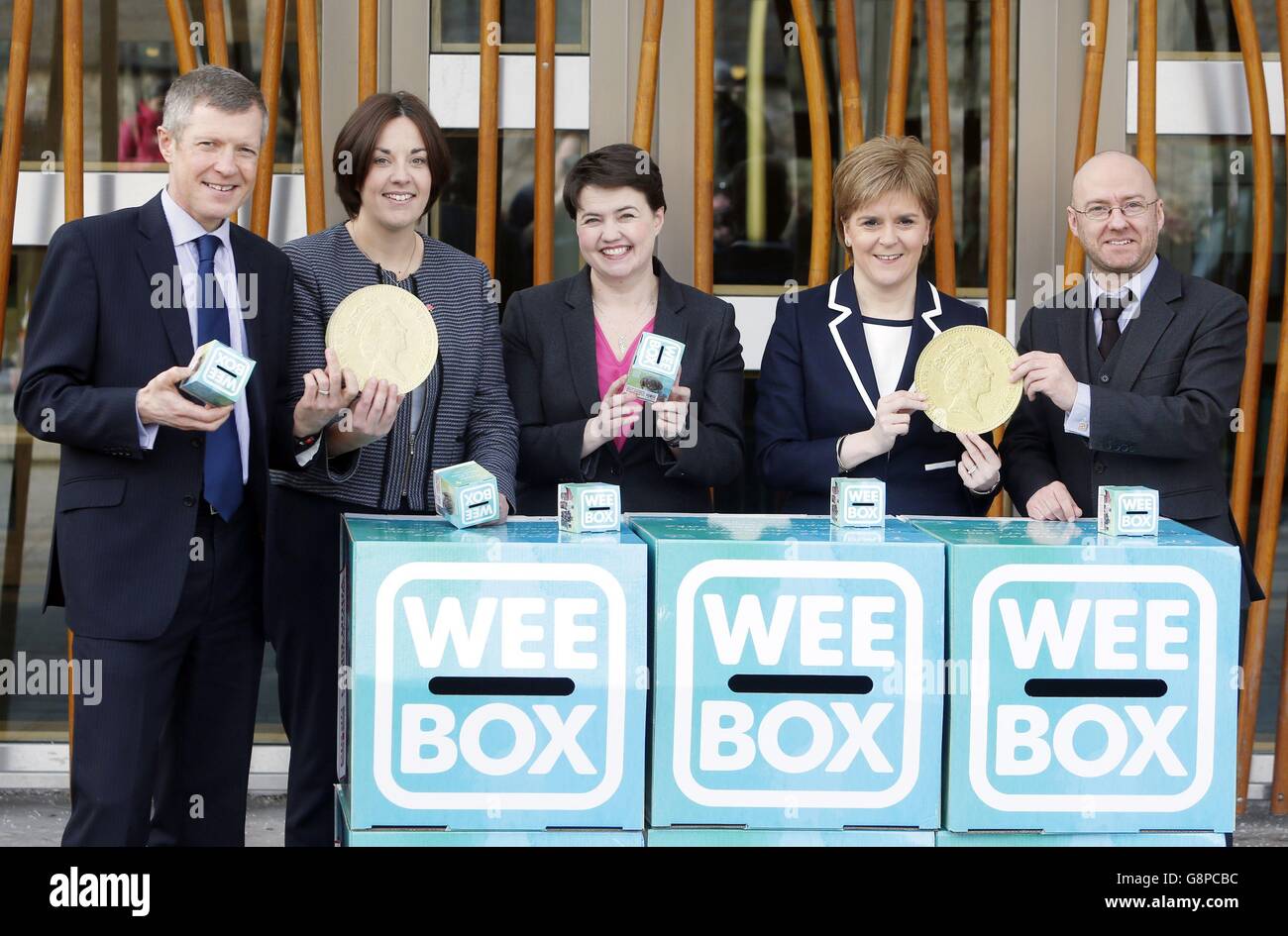 The leaders of all five main political parties in Scotland (left to right) Willie Rennie, Kezia Dugdale, Ruth Davidson, Nicola Sturgeon and Patrick Harvie, launch the annual Sciaf appeal outside the Scottish Parliament in Edinburgh. Stock Photo