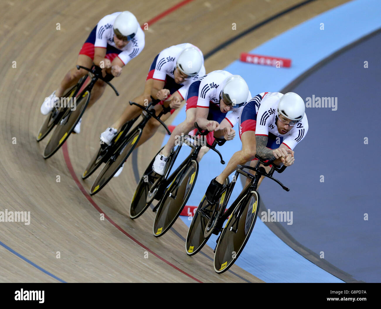 Great Britain's (right-left) Sir Bradley Wiggins, Edward Clancy, Jonathan Dibben and Owain Doull compete in the Men's Team Pursuit final during day two of the UCI Track Cycling World Championships at Lee Valley VeloPark, London. Stock Photo