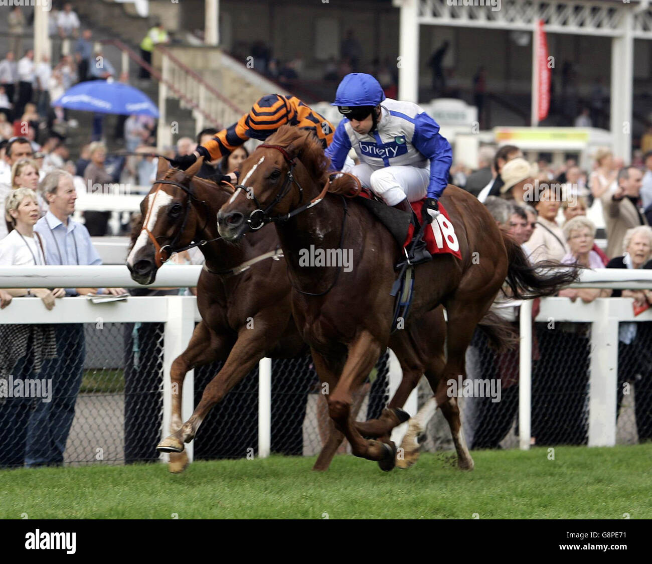 Reverence ridden by Kevin Darley (R) wins the Community Union Representing Betting Shop Staff Handicap at Doncaster racecourse, Friday September 9, 2005. PRESS ASSOCIATION Photo. Photo credit should read: Steve Parkin/PA. Stock Photo