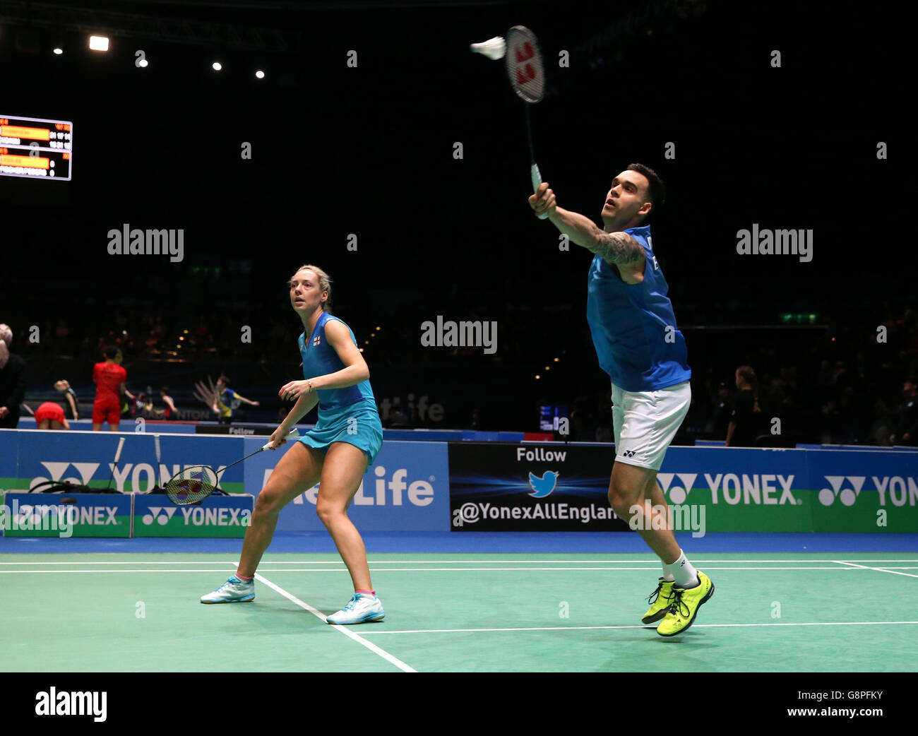 England's Gabby Adcock (left) and Chris Adock in action during their mixed doubles match during day one of the YONEX All England Open Badminton Championships at the Barclaycard Arena, Birmingham. Stock Photo