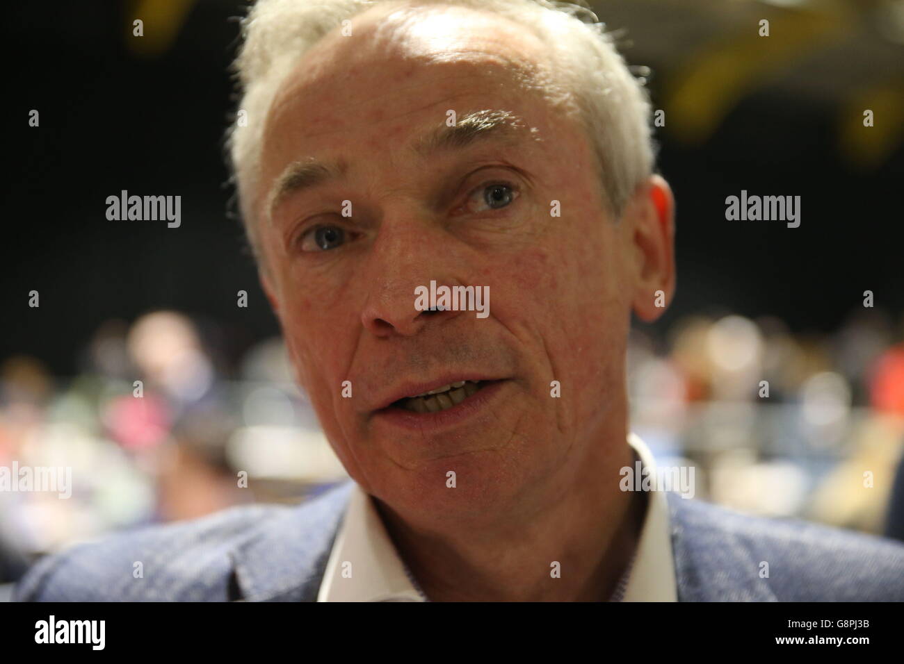Fine Gael candidate Richard Bruton speaks to members of the media at the election count centre at the RDS in Dublin, Ireland, as the general election 2016 count gets underway. Stock Photo