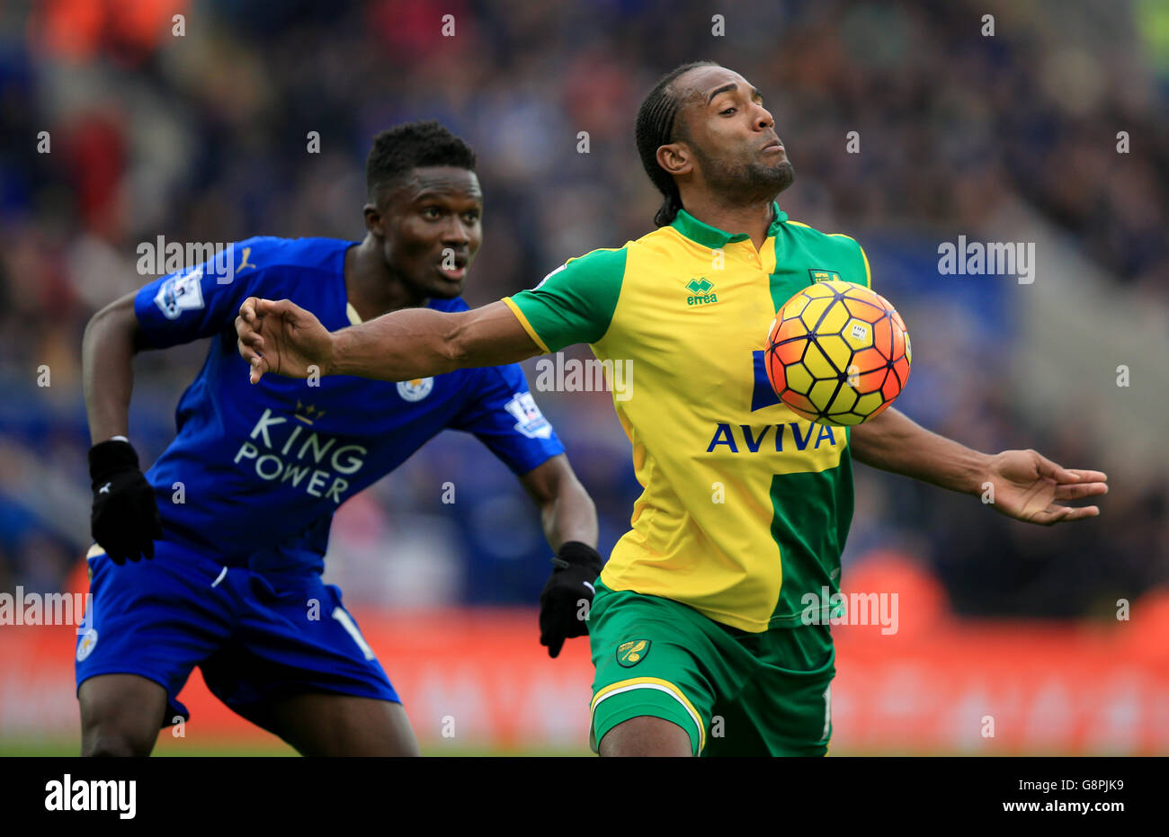 Norwich City's Cameron Jerome (right) chests the ball during the Barclays Premier League match at the King Power Stadium, Leicester. Stock Photo