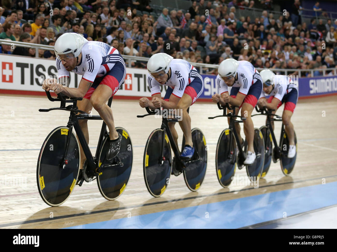 Great Britain's Sir Bradley Wiggins (left) during the Men's Team Pursuit qualifying during day one of the UCI Track Cycling World Championships at Lee Valley VeloPark, London. Stock Photo
