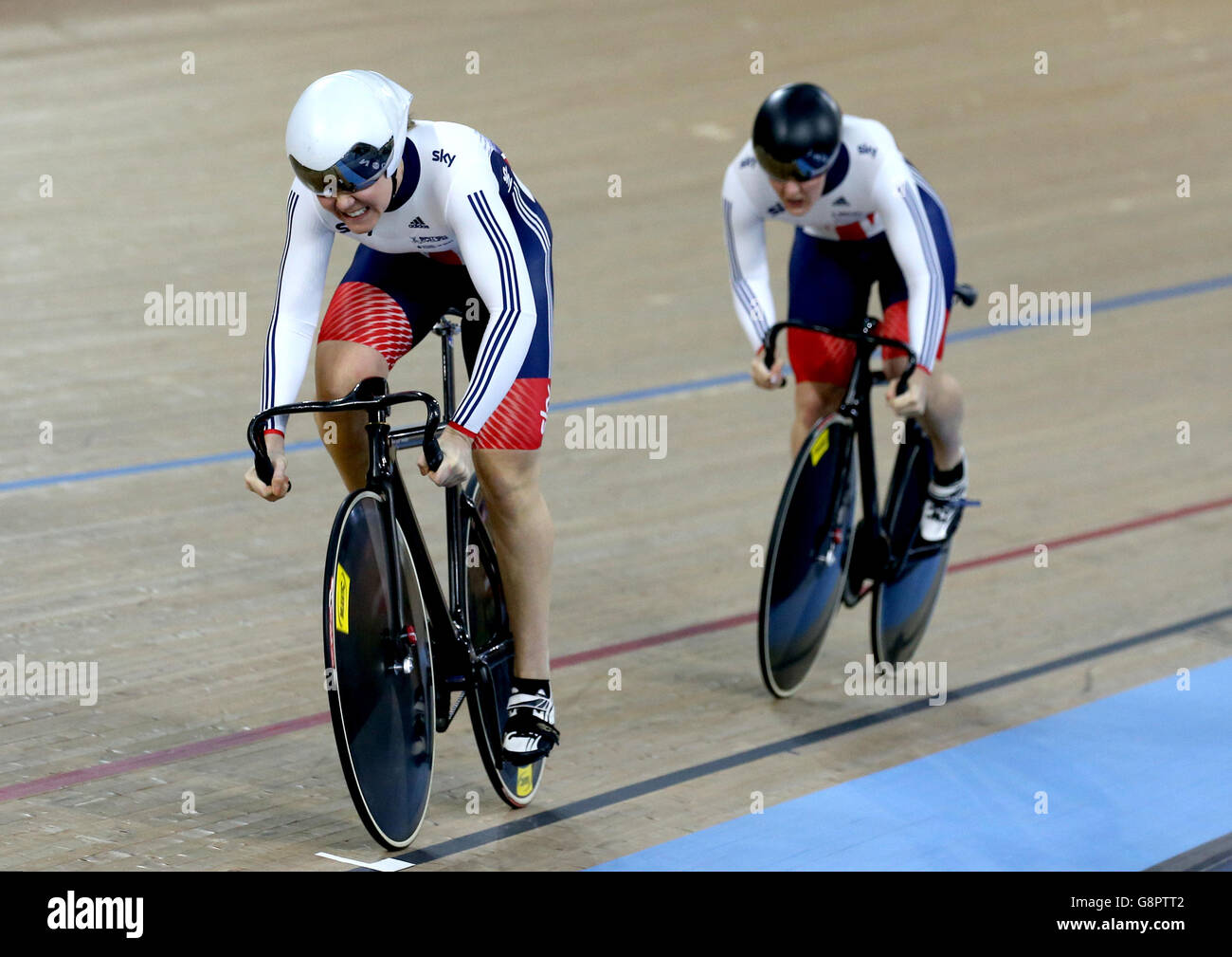 Great Britain's Jessica Varnish (left) and Katy Marchant compete in the Women's Team Sprint during day one of the UCI Track Cycling World Championships at Lee Valley VeloPark, London. Stock Photo