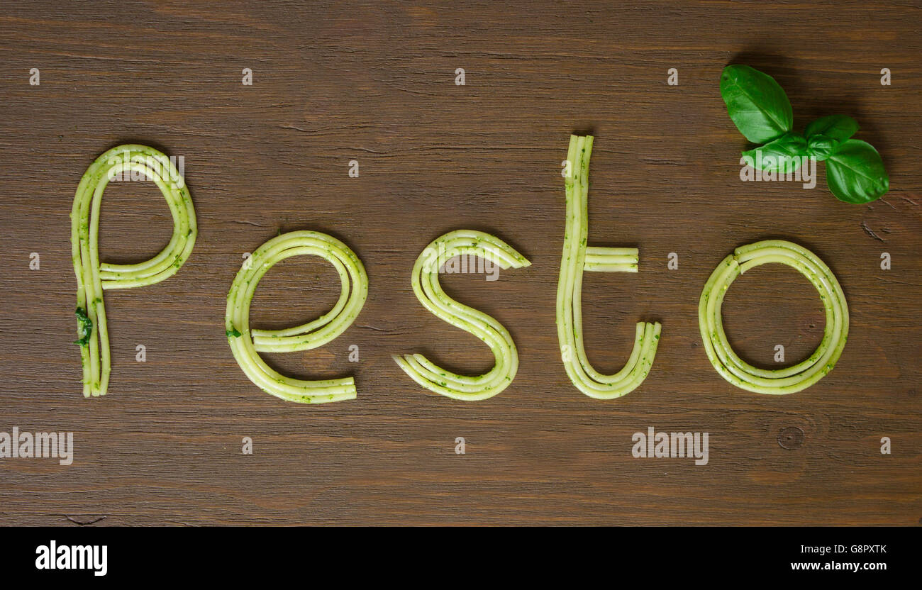 Word pesto made of cooked spaghetti with pesto souce Stock Photo Alamy
